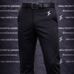 Golf trousers back view with custom logo embroidery and functional pockets