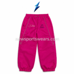 Pink windbreaker pant front view with reflective-style piping and elastic ankle cuffs