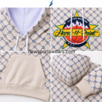 NSW Custom Hoodies in Bulk front view in cream and navy with an all-over pattern, lined hood, chest graphic and kangaroo pocket.
