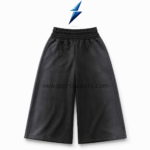 NSW Baggy Shorts front view with washed-black panels, white drawstring and three distressed graphics by NEW SPORTS WEAR