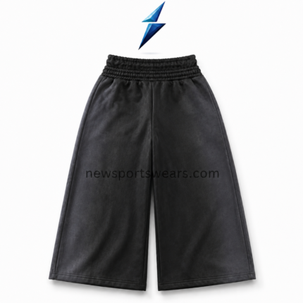 NSW Baggy Shorts front view with washed-black panels, white drawstring and three distressed graphics by NEW SPORTS WEAR