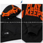 NSW New Sports Wear Graphic Hoodie showing orange hood artwork, twin stripes and snap necklineDetailed view of the graphic hood and metallic neckline snap