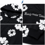 NSW New Sports Wear Flower Hoodie close-up showing double-layer hood, drawcords and white floral graphics