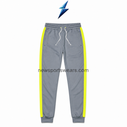 NSW New Sports Wear Men’s track pants in grey with neon-yellow side stripes, front view