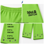 NSW New Sports Wear green pants with black statement typography