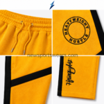NSW Track Pants for Men showing an elastic golden-yellow waistband and contrasting black drawcord