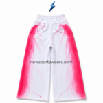 NSW Women’s Wide Leg Sweatpants in white and pink with red graphic prints, layered waistband and front drawcord