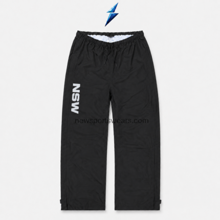NSW Tearaway Pants in black with elastic drawstring waist, side pockets and vertical white logo