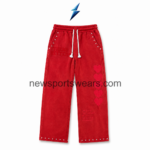 Red wide-leg Women’s Tracksuit pants with white drawcord, studded pockets and NSW New Sports Wear branding